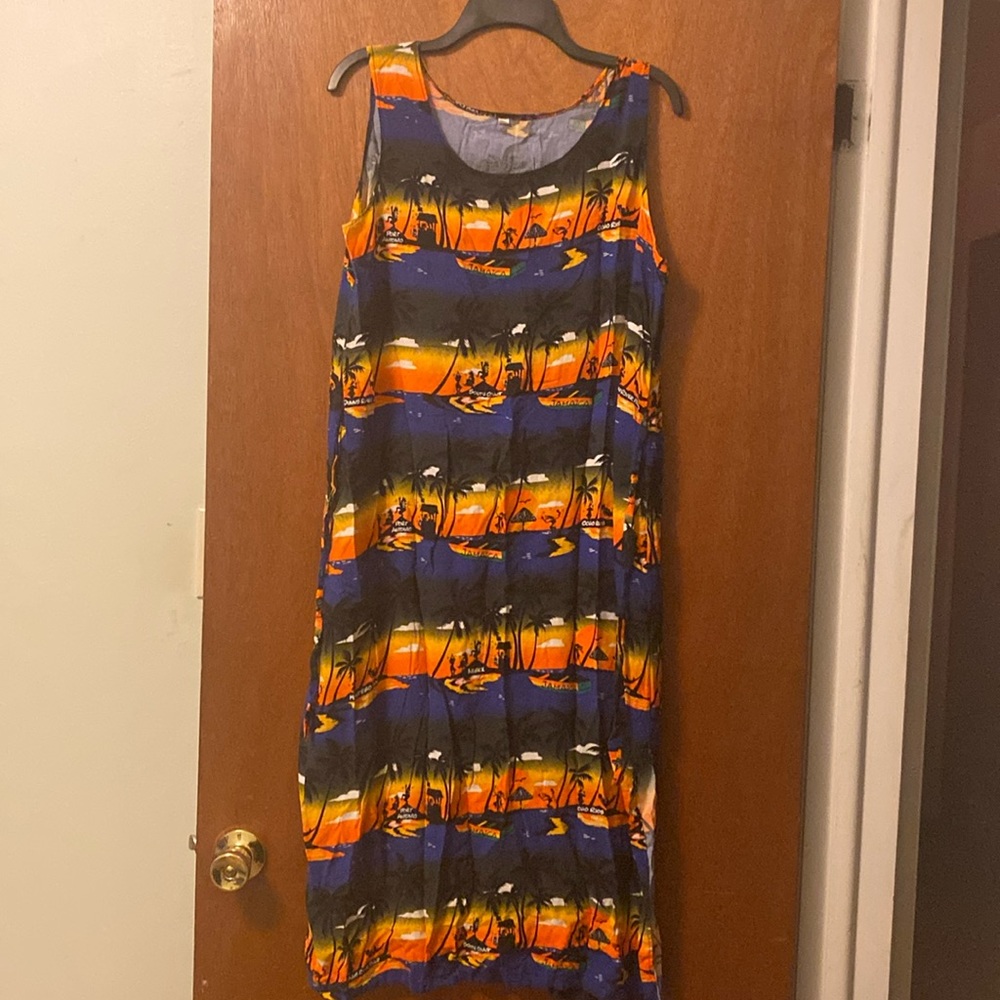 Large Blue and Orange Sundress with places in Jamaica written on it.